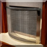 D15. Steel fireplace screen with leather handles. 